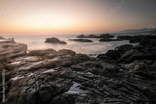 Landscape view of the sunset over the rocky seascape