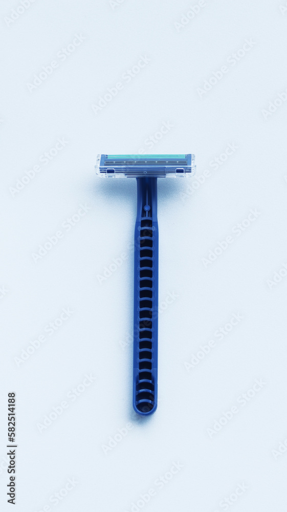 Disposable blue plastic shaver isolated on white. Disposable blue plastic shaver isolated on white.