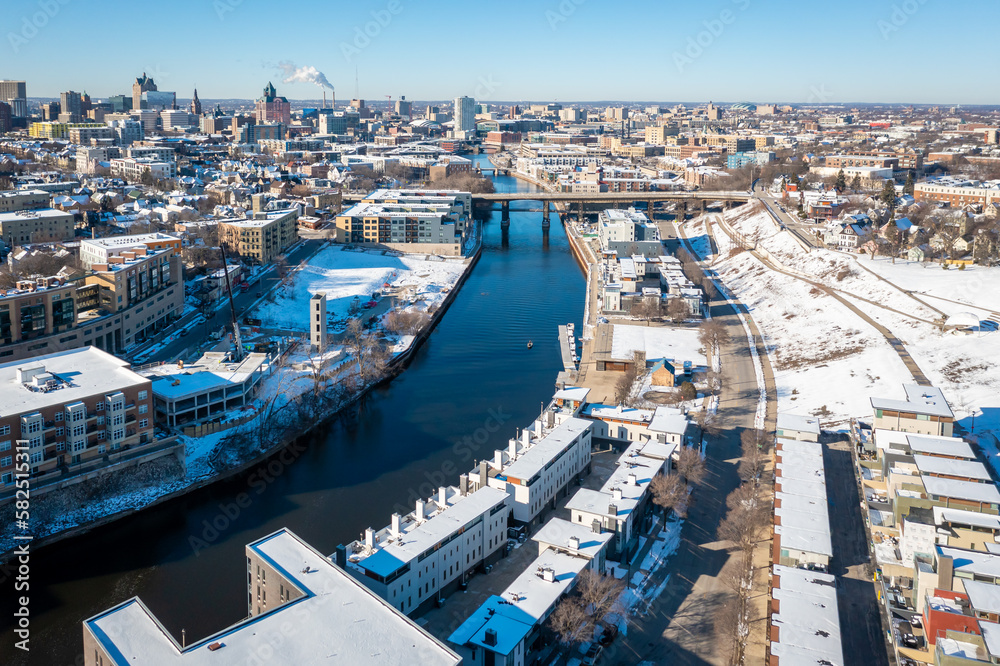 Milwaukee, WI USA - March 18, 2023: Aerial view of Milwaukee Wisconsin featuring the downtown Milwaukee skyline and Milwaukee River. Taken from approx North Avenue and Commerce St. 