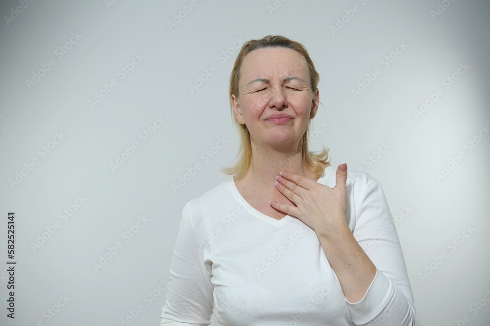 sore throat vocal cords tense woman can't speak she sticks out tongue