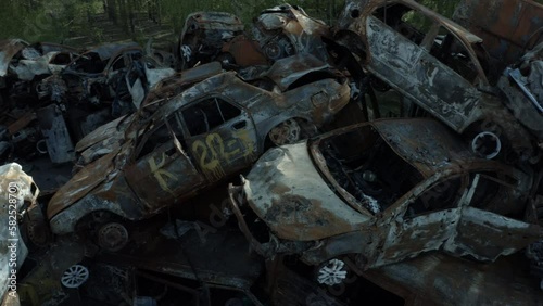 Destroyed cars. The war in Ukraine with Russia. Results of aerial bombing. The cemetery of cars. An act of terrorism. Bucha, Irpen, Kherson, Bakhmut, Solidar. Shots and footage from the sky. Quadcopte photo