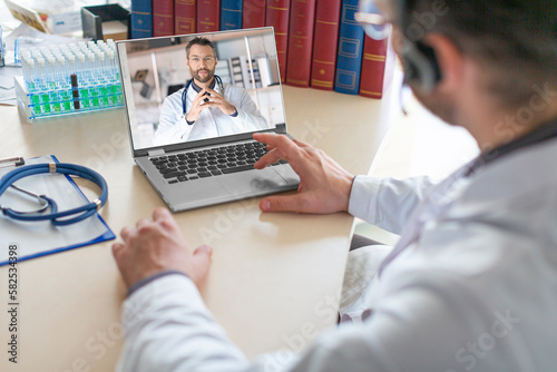 Virtual Consultation Between Two Doctors in Medical Office.