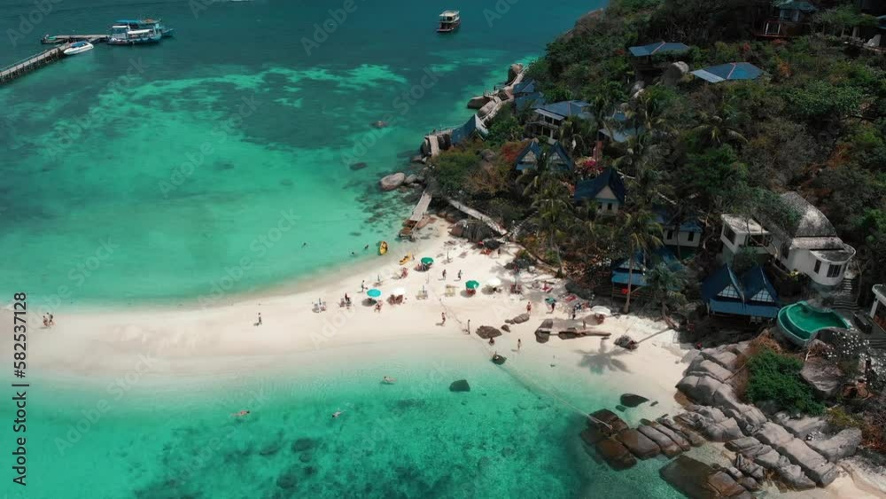 Aerial view, beach of Koh Tao in Southern Thailand with blue ocean and Koh Nang Yuan island. Summertime paradise island with thin sandy strip. Place for perfect snorkeling. High quality 4k footage Aerial view, beach of Koh Tao in Southern Thailand with blue ocean and Koh Nang Yuan island. Summertime paradise island with thin sandy strip. Place for perfect snorkeling. High quality 4k footage