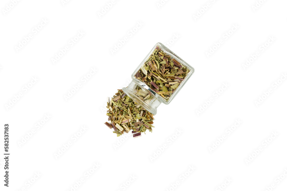 Catnip herb in latin - Nepeta cataria falling out of a glass jar isolated on white background. Medicinal herb. Catnip herb in latin - Nepeta cataria falling out of a glass jar isolated on white background. Medicinal herb.