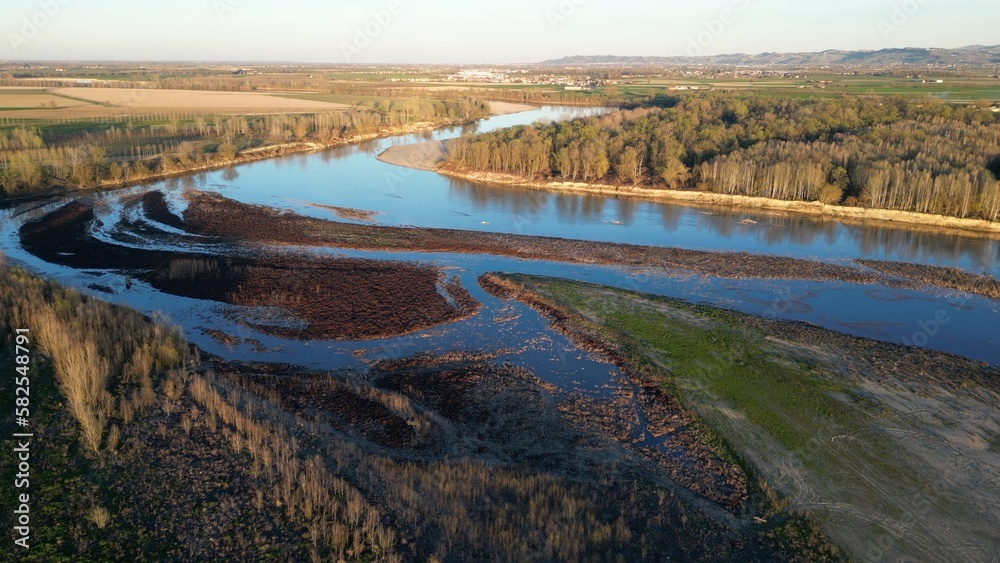 water emergency and drought  due to lack of rain due to global warming  - Drone aerial view of dry river with scarcity of water in Lombardy Pavia - Po the biggest  river in Italy 