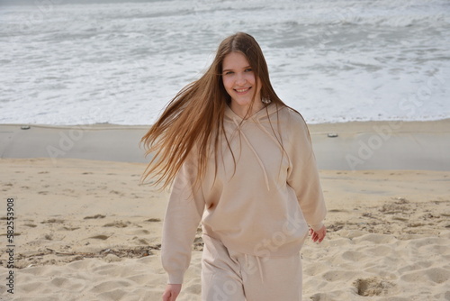 young girl happy on the beach