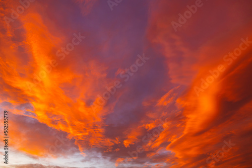 Dramatic orange clouds at sunset. Sunset cloudscape.