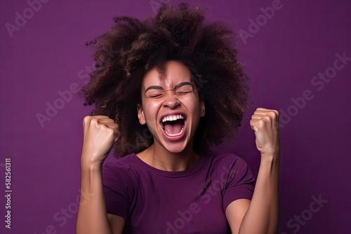 Portrait of a Woman with Fists in the Air Celebrating Success,/Win on a Purple Background (Generative AI)
