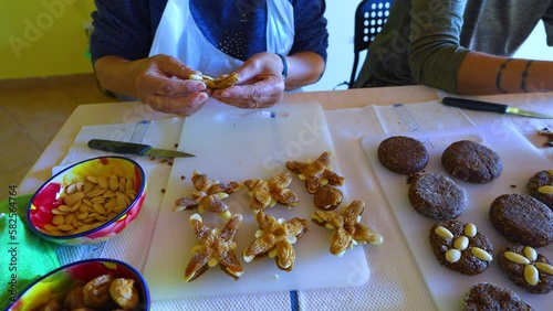 Elaborating Stars, traditional sweets made of figs and almonds. Atlantic Ocean. Algarve. Portugal. Europe