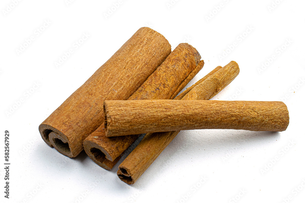 Cinnamon sticks close-up view, macro photography, isolated on white background high quality details Cinnamon sticks close-up view, macro photography, isolated on white background high quality details