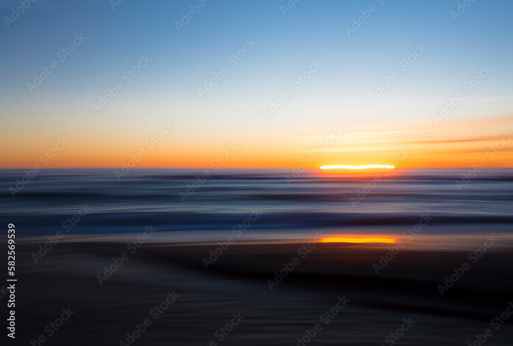 Abstract beach sunset using intentional camera movement
