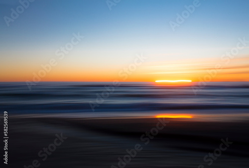 Abstract beach sunset using intentional camera movement 