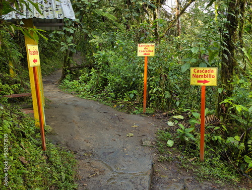 Signposts on hiking track in Minjoy Park in Mindo, Ecuador, South America
 photo