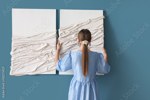 Young woman hanging 3D pict...