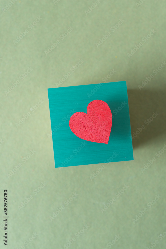 red heart on a mostly green background red heart on a mostly green background