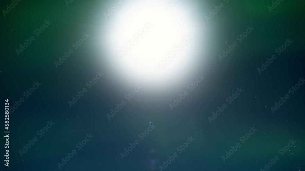 Aurora Borealis, Northern Lights in Iceland, Real Night Sky with Stars and Moon Time Lapse, Astronomical Phenomenon, Solar Wind, Earth Electromagnetic Field. Aurora Borealis, Northern Lights in Iceland, Real Night Sky with Stars and Moon Time Lapse, Astronomical Phenomenon, Solar Wind, Earth Electromagnetic Field.