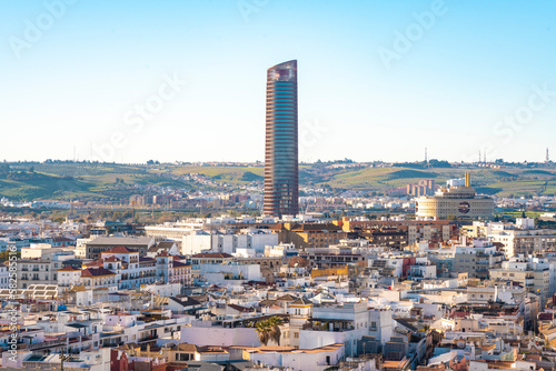 View of the historic center of Seville with Torre Sevilla or the tower of Seville in the background