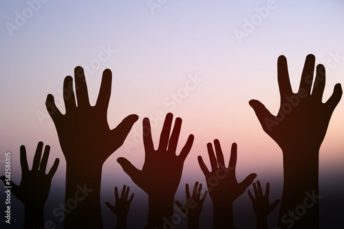 silhouette of the detainee's hand raise up for help to want freedom
