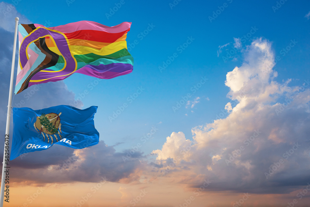 large Inclusive Progressive lgbt Pride flag and flag of Oklahoma state