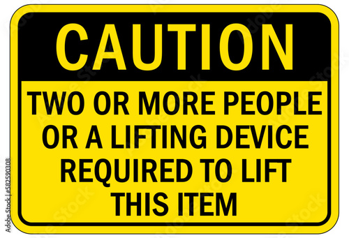 Lifting instruction sign and labels two or more people or a lifting device required to lift this item