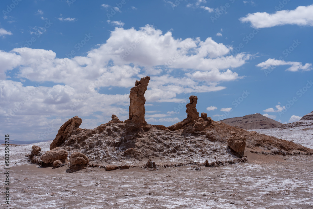 Three Marys (Las tres Marias) natural rock formation in Valley of the Moon (Valle de la Luna) in San Pedro de Atacama, Chile. Valley of the Moon is a valley in Los Flamencos National Reserve.