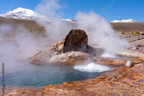 Fototapeta Naklejka Na Ścianę i Meble -  One of  the active geysers of El Tatio, Chile. El Tatio is a geothermal field with many geysers near the town of San Pedro de Atacama in the Andes Mountains of northern Chile. 