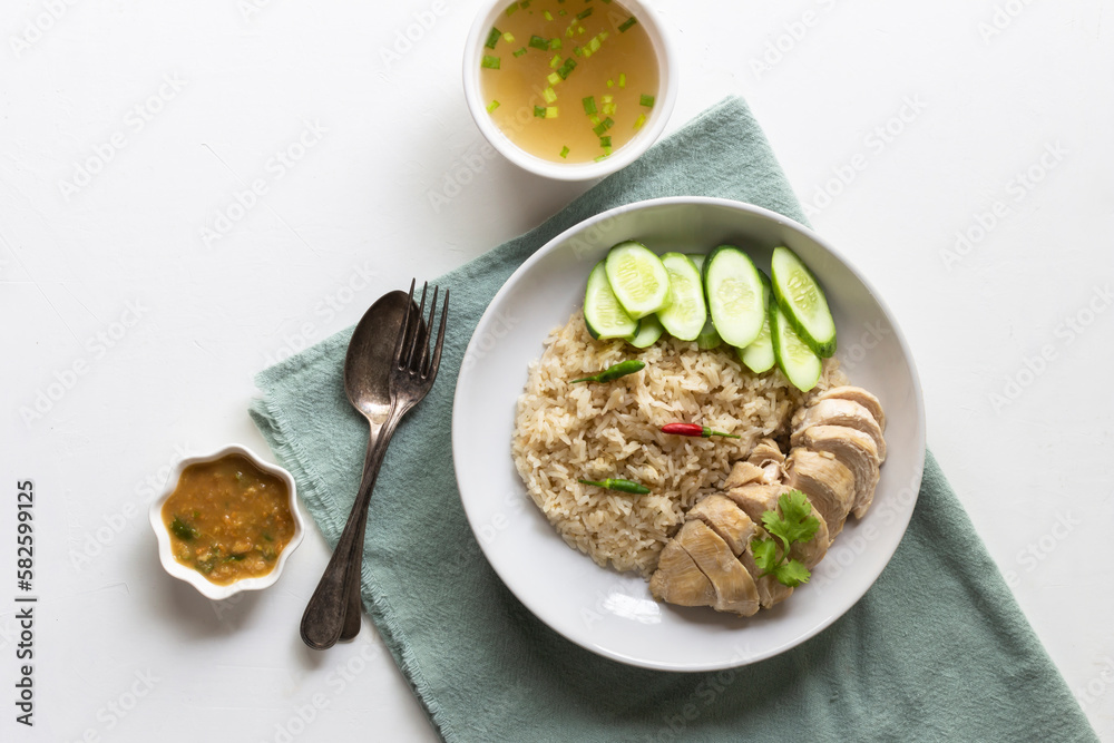 Asian healthy food chicken rice steam in bowl on white background.