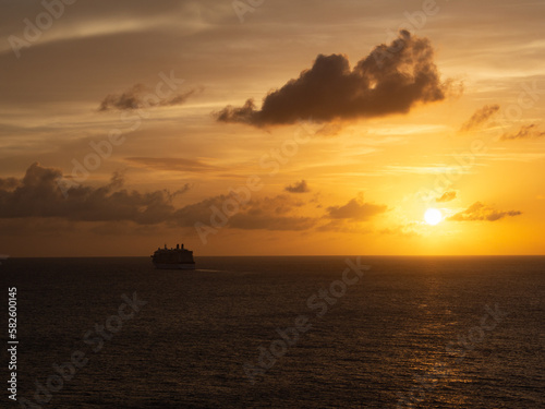 Sunset Cruise Ship On Voyage in the Ocean
