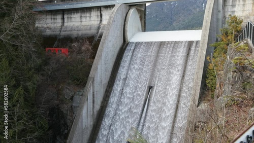 Water flowing down the spillway of a Hydro Electric Dam. Perfect B-Roll footage for your industrial, energy, or sustainability-related video projects.