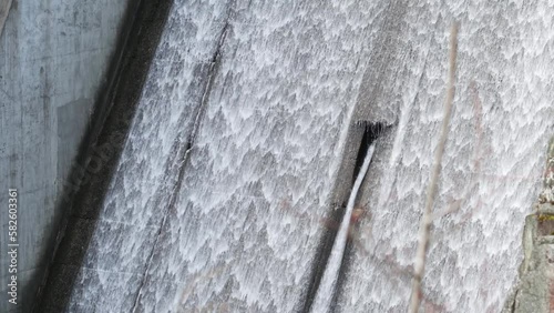 Water flowing down the spillway of a Hydro Electric Dam. Perfect B-Roll footage for your industrial, energy, or sustainability-related video projects.