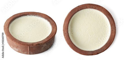 set of homemade curd in clay pot or container, thick yogurt or milk product in earthen clay pot or terracotta pot which makes less sour and turns sweeter, isolated photo