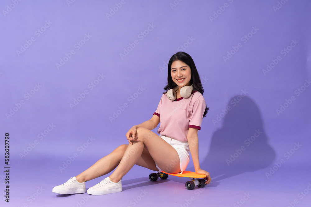 beautiful young girl on purple background beautiful young girl on purple background