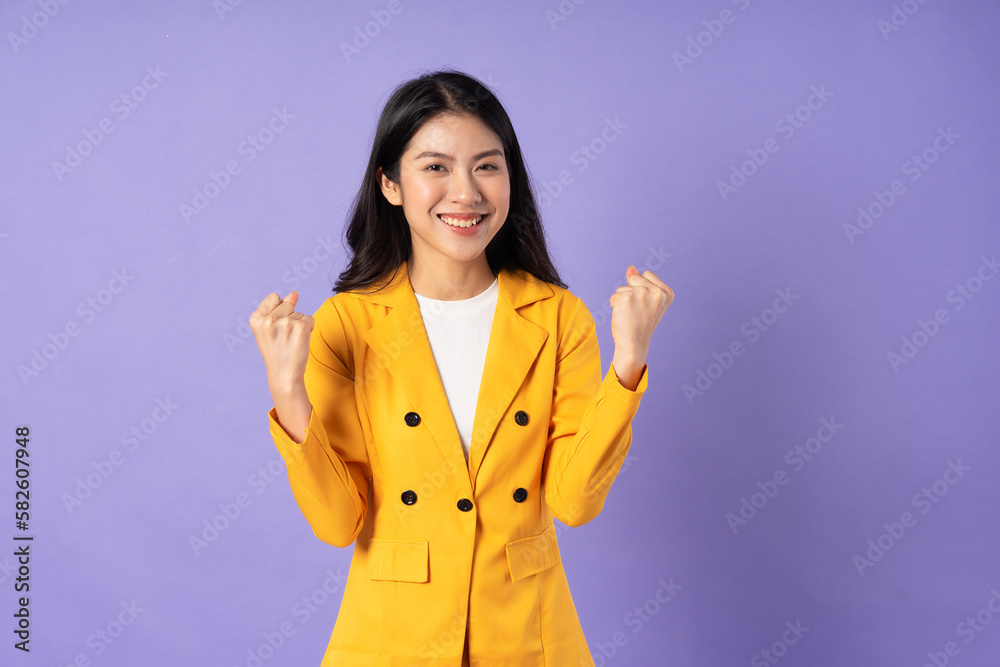 portrait of young businesswoman on purple background portrait of young businesswoman on purple background