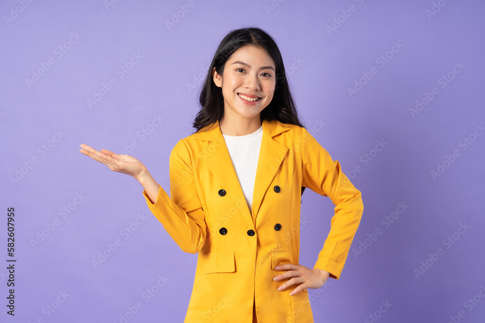 portrait of young businesswoman on purple background portrait of young businesswoman on purple background