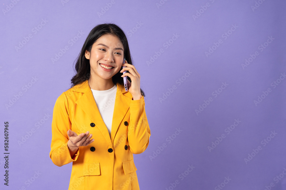 portrait of young businesswoman on purple background portrait of young businesswoman on purple background
