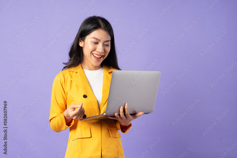 portrait of young businesswoman on purple background portrait of young businesswoman on purple background