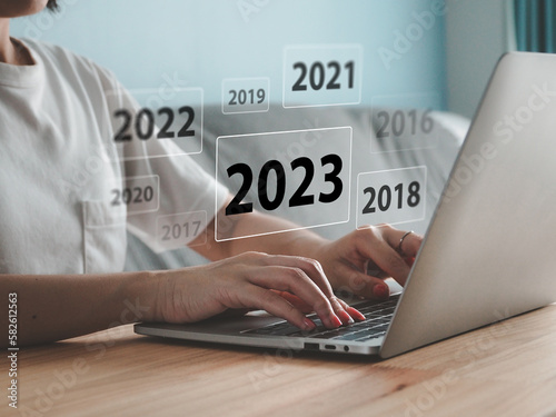 business investor Analyzing 2023 visual charts, strategies, investments, business planning.