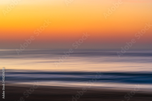 Soft and silky abstract sunrise at the seaside