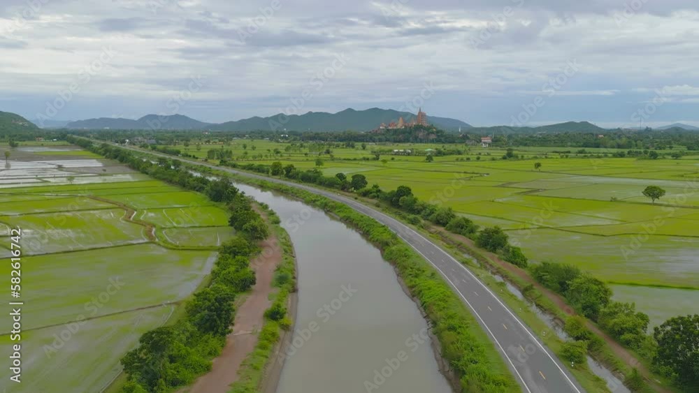 Aerial top view of paddy rice terraces with water reflection, green agricultural fields in countryside, mountain hills valley, Pabongpieng, Chiang Mai, Thailand. Nature landscape. Crops harvest. Aerial top view of paddy rice terraces with water reflection, green agricultural fields in countryside, mountain hills valley, Pabongpieng, Chiang Mai, Thailand. Nature landscape. Crops harvest.