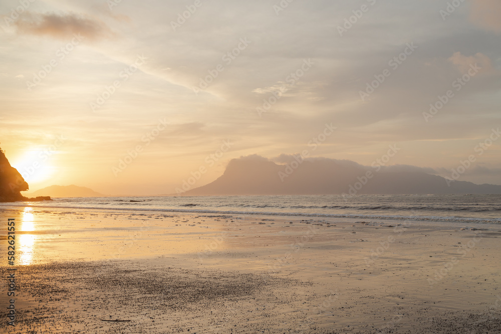 Bako national park, sea sandy beach, overcast, cloudy sunset, sky and sea, low tide. Vacation, travel, tropics concept, Malaysia Bako national park, sea sandy beach, overcast, cloudy sunset, sky and sea, low tide. Vacation, travel, tropics concept, Malaysia