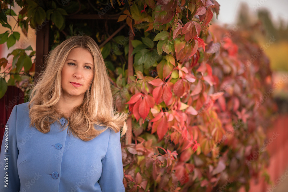 Portrait of a young beautiful blonde girl outdoors in spring. Portrait of a young beautiful blonde girl outdoors in spring.