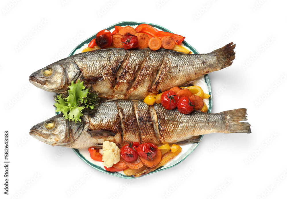 Plate with delicious baked sea bass fish and vegetables on white background, top view