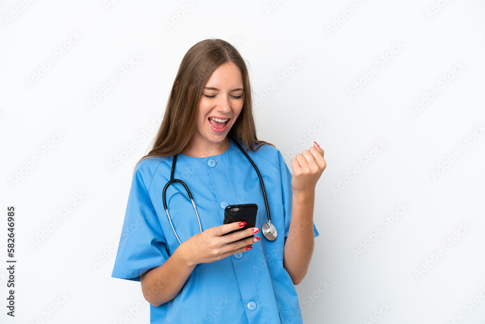 Young surgeon doctor Lithuanian woman isolated on white background with phone in victory position Young surgeon doctor Lithuanian woman isolated on white background with phone in victory position