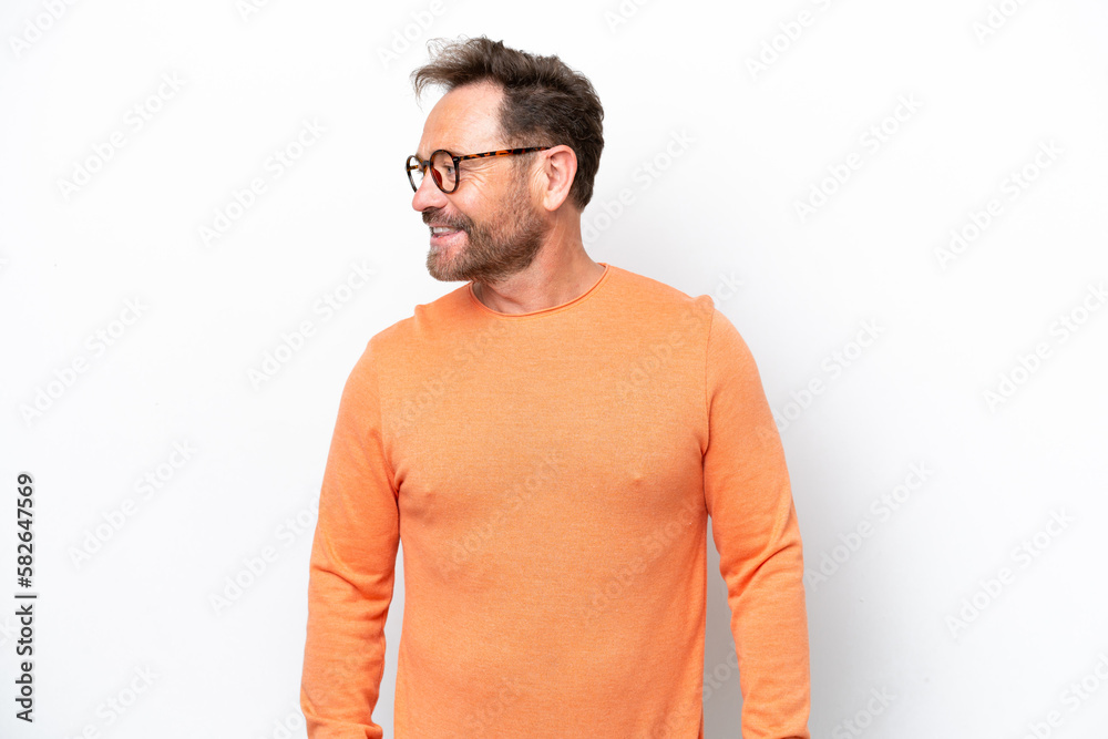 Middle age caucasian man isolated on white background looking side Middle age caucasian man isolated on white background looking side