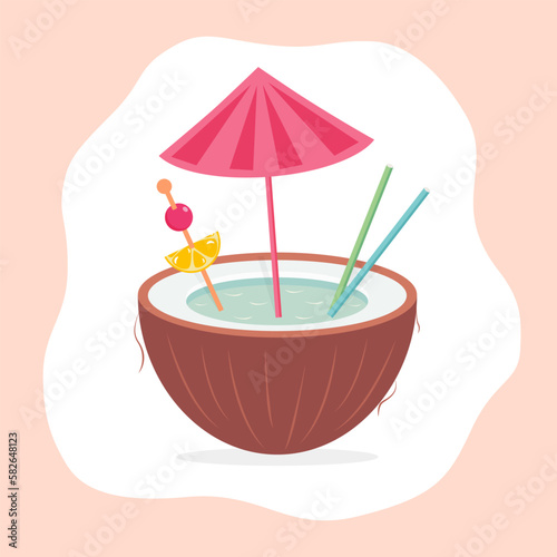 Delicious coconut cocktail with umbrella and straws