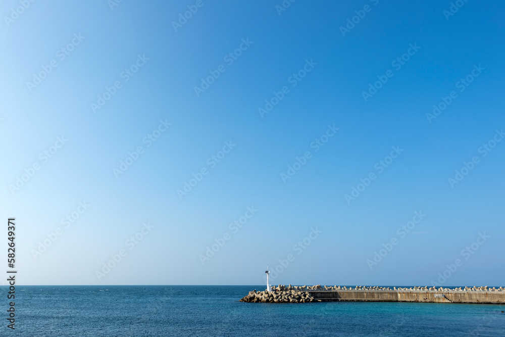blue sky and white lighthouse