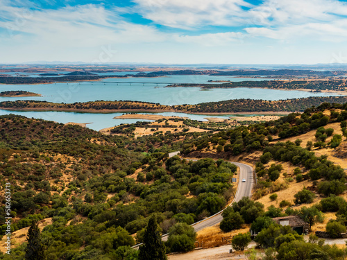 Wonderful landscape with rolling hills and Alqueva lake in background, Monsaraz, Portugal  photo