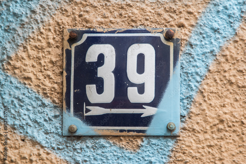 © varbenov - Weathered grunge square metal enameled plate of number of street address with number 39 © varbenov - Weathered grunge square metal enameled plate of number of street address with number 39