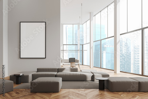 White office lounge with sofa and poster