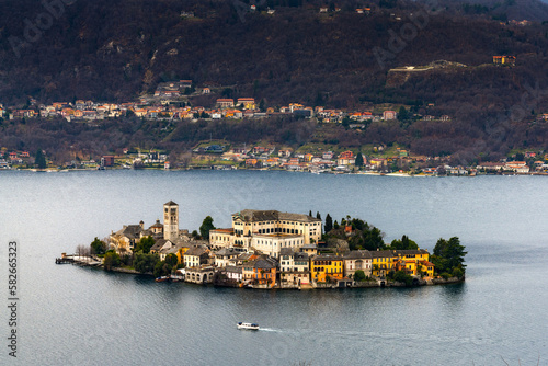 view of Lake Orta and the Isola San Guilio islet with its historic buildings